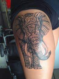 Pretty Tattoo Design Ideas For Women For Thigh Back And Arms Elephant Thigh Tattoo Thigh Tattoo Designs Side Thigh Tattoos