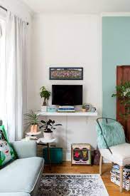 A Super Small 375 Square Foot Studio Is Masterfully Arranged Small Apartment Living Room Living Room Furniture Arrangement Tiny Living Rooms