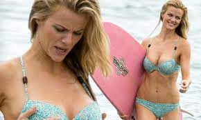 Brooklyn Decker corrects her errant curves after her bikini slips down  during surfing shoot | Daily Mail Online