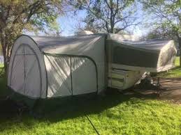Keystone 2001 model 2100 series sleeps 8 6 comfortably 21 feet long 2 pop out queen and double shower toilet fridge stove furnace air conditioner 2 axles weight. 2001 Used Rockwood Premier Pop Up Camper In Texas Tx