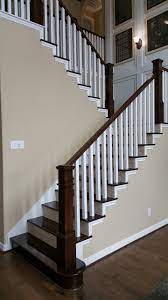 This Staircase Uses High Quality Wood Balusters To Create A Unique Craftsman Style Design Featured Is The Plain Banister Remodel Wood Balusters Stair Remodel