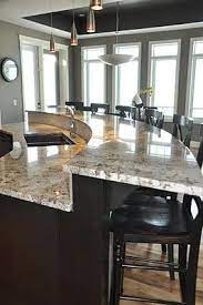 Curved island why not go for something a bit more different with this curved kitchen island that comes with amazing seating and will surely allow bar stool for the kitchen island, bar, restaurant and more. Curved Bar Curved Kitchen Kitchen Remodel Small Curved Kitchen Island