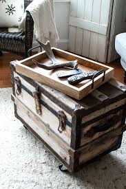 We also have an exciting variety of chest built with carefully selected reclaimed wood. Rustic Wood Tray On A Trunk Coffee Table With Antlers For Winter Decor Funky Junk Interiors