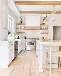 Remodeling a kitchen is full of possibilities, and even a few simple budget kitchen ideas can modernize your space. White And Wood Kitchen Remodel Reveal Pinteresting Plans