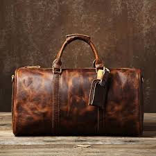 This weekender garment bag is perfect for showing off your distinctive style even while you are traveling. Genuine Leather Mens Large Camel Travel Bag Cool Duffle Bag Shoulder B Iwalletsmen