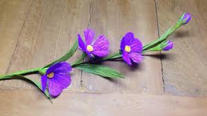The size of the flower depends on the amount of crepe paper you cut. Small Crepe Paper Flowers Flower Making Of Crepe Paper Paper Flower Tutorial Youtube