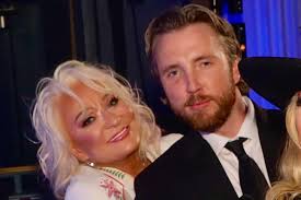 33 years ago today, I welcomed my son, Beau Grayson, into the world. The  night before, I spoke with Clint Black, and somehow word got out—during the  award show, he and Roy