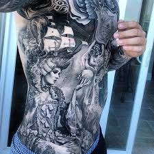 A tattoo artist inked his dog on. Photo Realistic Tattoo All Things Tattoo