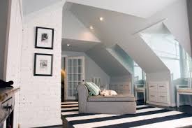 Many bedrooms on an upstairs floor or in a converted attic have sloped ceilings above a knee wall. How To Decorate A Sloped Ceiling Bedroom