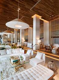 This luxury hotel places an emphasis on culture — think musical and literary programming, plus art exhibits — in a refined oasis that combines beachy decor with the elegant atmosphere of a gentleman's club. Inside The New 1 Hotel South Beach Miami Hotel Interiors Hotel Interior Design Hotel Decor