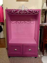 Amazing gallery of interior design and decorating ideas of built in armoire in bedrooms, closets, living rooms, dens/libraries/offices, girl's rooms, nurseries, laundry/mudrooms, boy's rooms, kitchens, entrances/foyers by elite interior designers. Diy Dress Up Kid S Armoire Repurposed Tv Stand Kids Armoire Old Entertainment Centers Armoire Diy
