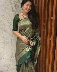 Kollywood actress subalakshmi rangan in black saree with red and green border from ival in mabia. Actress Sneha Is Diwali Ready In An Emerald Green Kanchipuram Saree