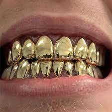 Custom grillz to perfectly fit your teeth, guaranteed! 10k Solid Gold 8 Top 8 Bottom Gold Teeth Master