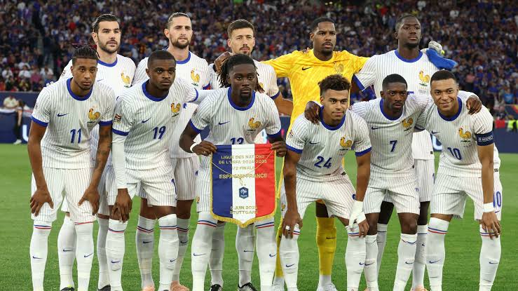 Les Bleus Lineup: Didier Deschamps fielded a highly tactical side to secure immediate qualification., AI generated