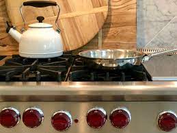 A very small kitchen disaster left us with grease burned on to the outside of a stainless steel pot. How To Clean Grease Off Stainless Steel Using A Magic Cleanser Happy Haute Home