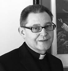 Devotion to St. John Paul II brings honor to pastor For their efforts  priests earn title of honorary Canon