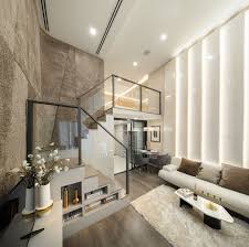 An impressive spiral staircase is the central focus of the penthouse creating a sense of urban opulence. Luxurious Compact Modern Condo Apartment With Double Height Ceiling Idesignarch Interior Design Architecture Interior Decorating Emagazine