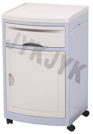 A cabinet bed is the better choice over other. China Bedside Cabinet With Over Bed Table Photos Pictures Made In China Com