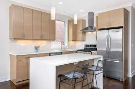 Modern Kitchen With Dark Hardwood Floors Light Wood Cabinets Pendant Lighting Stainless Stee White Modern Kitchen Wood Floor Kitchen Interior Design Kitchen