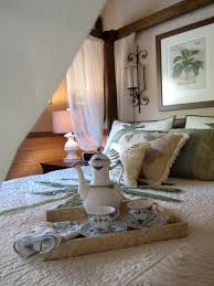Quilted bedspread and pillows in eggplant purple make for a bold visual accent. British Colonial Bedroom Houzz