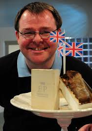 An amazing piece of history': Slice of Queen's wedding cake, discovered in  a filing cabinet, sells for £1,100