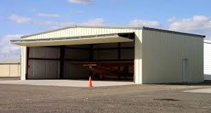 50 X 40 Steel Airplane Hangar With 36 X 13 Bifold Door Airplane Hangar Steel Buildings Steel Buildings For Sale