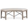 You have to think about replacing the ordinary chairs with the curved bench for round dining table. 1