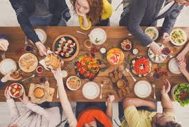 Simple, tasty recipes that can either be whipped up in a jiffy or made a day ahead. People Eat Healthy Meals Atpeople Eat Healthy Meals At Festive Table Served For Party Friends Celebrate