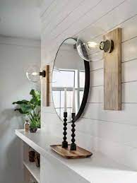 This will help you determine where to place the frame hanger strip. How High To Hang Wall Sconces Bellacor