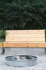 The fire pit only has a single storey wall around it and that wall extends into a full circle to stand on. Our Diy Fire Pit Building Sealing The Wood Benches Houseful Of Handmade