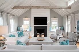 A blue accent wall anchors this blue and gray living room in an authentic farmhouse remodeled by chango and company. 11 Most Attractive Grey And Blue Living Room Ideas That You Will Love Jimenezphoto