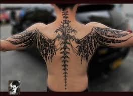 Spine Tattoos For Men Have A Wonderful Place Literally In The World Of Ink Art With Such Great Placement On The Bo Spine Tattoo For Men Bone Tattoos Tattoos