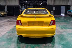 Image result for Yellow 2004 Pontiac