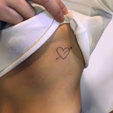 Check spelling or type a new query. Heart And Arrow Tattoo On The Rib