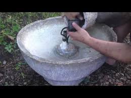 A submersible pump creates a flow that keeps your water fresh so insects don't breed. How To Fix And Replace A Water Fountain Pump A Tetra Pump Water Fountain Pumps Diy Water Fountain Water Fountain