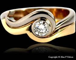 A Single Stone Rub Over Set Diamond S Shaped Palladium Engagement Ring With 18ct Yellow Gold Wedding Ring Shapes Palladium Engagement Rings Wedding Ring Bands