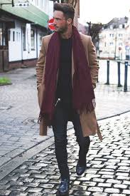 It consists of a camel sweater dress paired with black leggings and black suede ankle boots. Men S Camel Overcoat Black Crew Neck Sweater Black Skinny Jeans Black Leather Chelsea Boots Lookastic