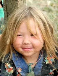 Why do Hispanics and Asians have black hair?