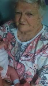 I just found this photo of my mum in a drawer is it just me or do others  See it too i see a loveheart