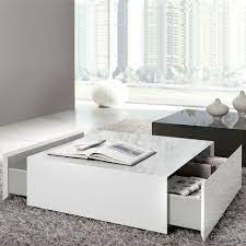 Joss & main's white coffee tables bring a clean, calm look to a room, and their neutral hue can serve to tie together the elements of the surrounding decor. Box White Gloss Coffee Table With Drawers White Coffee Table Modern White Gloss Coffee Table Coffee Table White