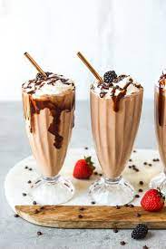 Chocolate Banana Milkshake That Tastes Like Ice Cream Time To Cool Off While Adding Some N Chocolate Banana Milkshake Banana Milkshake Recipe Chocolate Banana