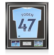 The kit is then completed with white shorts and. Phil Foden Back Signed Manchester City 2020 21 Home Shirt In Classic Frame Ebay
