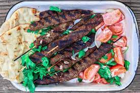 Set all of the kabobs into a roasting pan in one layer and set aside. Kofta Kebab Recipe With Video The Mediterranean Dish
