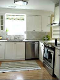 Installing crown molding on cabinets makes them look sophisticated. Feature Friday Involving Home And Color Kitchen Remodel Cost Above Kitchen Cabinets Kitchen Soffit