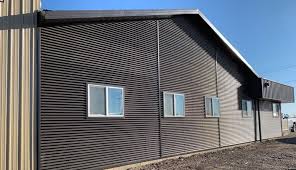 Corrugated metal siding may be durable and for the most part maintenance free, but when it comes time to installing a window in your building, the procedure is a bit different than when installing a window in a building with conventional siding. 7 8 Corrugated Forma Steel Metal Siding And Roofing
