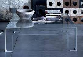 The piece features a stunning leg design finished in a beautiful dark walnut, topped with aged mirror insert. Glas Italia Atlantis Coffee Table Transparent Made In Design Uk