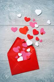 All of these valentines day backgrounds are of 1024x768 resolution and so ideal as your desktop background image on this valentines day on february 14th. Letter With Heap Of Small Hearts On Wooden Background Valentines Stock Photo Picture And Royalty Free Image Image 66139670