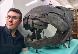 Dunkleosteus Is An Extinct Genus Of Armored Placoderm Fish That Existed During The Late Devonian Human With Surpr Geology Sea Monsters Petrified Wood Jewelry