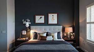 The cushions and bedspreads are in different shades of pink, ranging from pale pink to bright, glamorous pink. Bedroom Interior Design India By Putra Sulung Medium