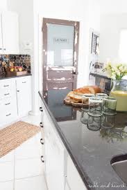 The fact that oak is more readily available and cheaper than rift oak makes it a popular choice. Rustic Gray Farmhouse Kitchen Reveal T H Kitchen Makeover Table And Hearth